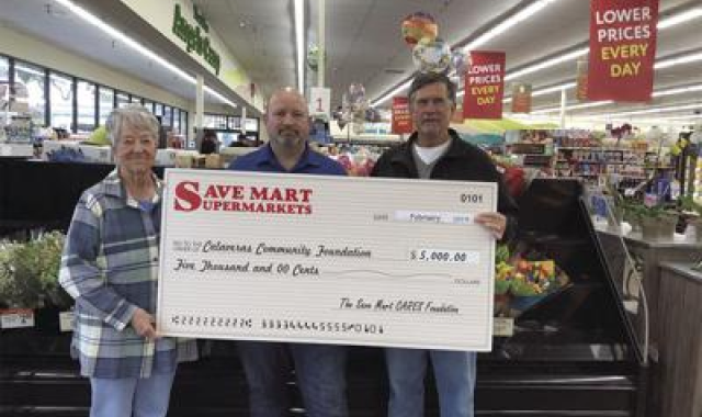 Community members receiving a $5,000 grant from The Save Mart Companies CARES Foundation