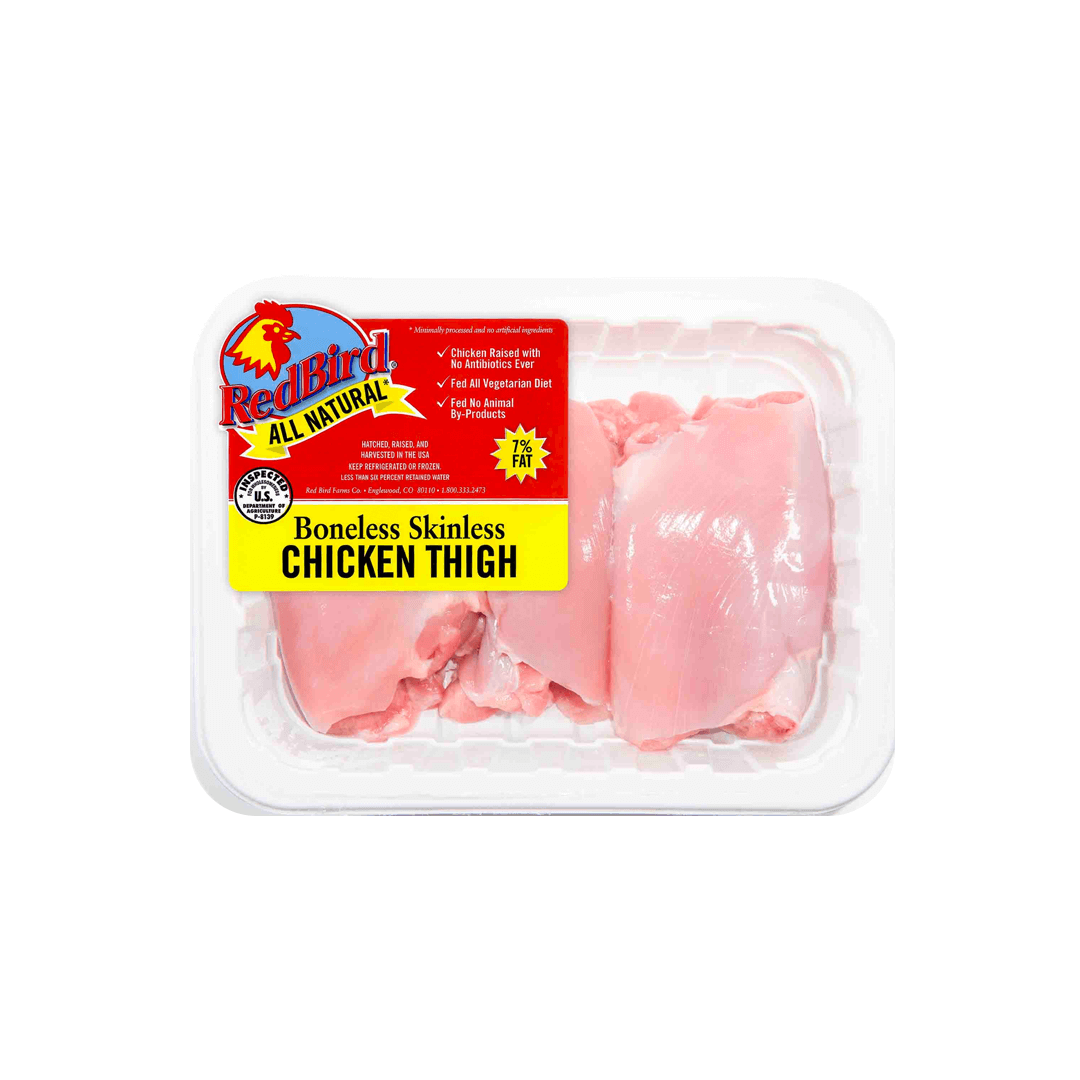 Red Bird boneless skinless chicken thigh in white tray, yellow and red label.