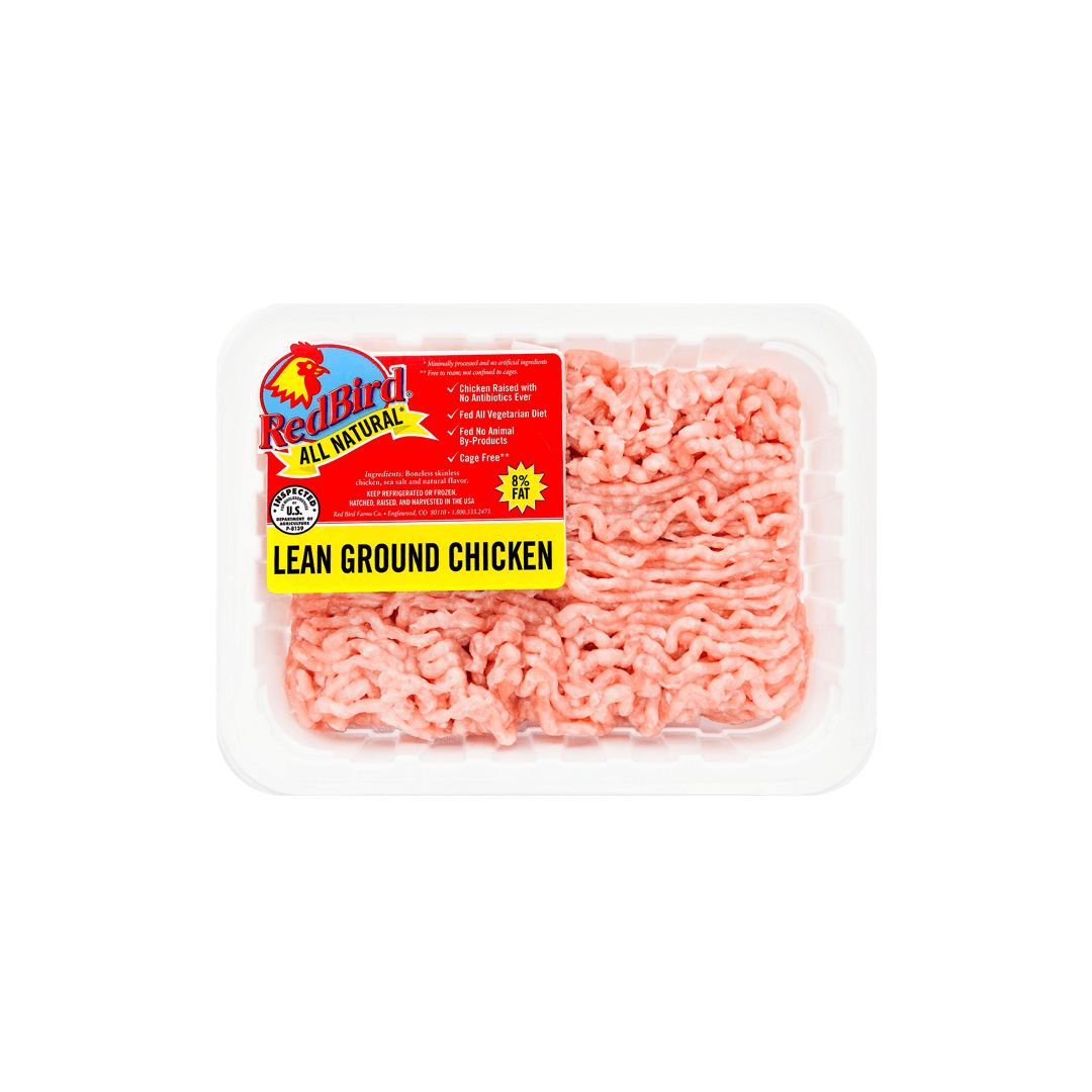 Red Bird lean ground chicken in a white tray with red label, 98% fat-free.