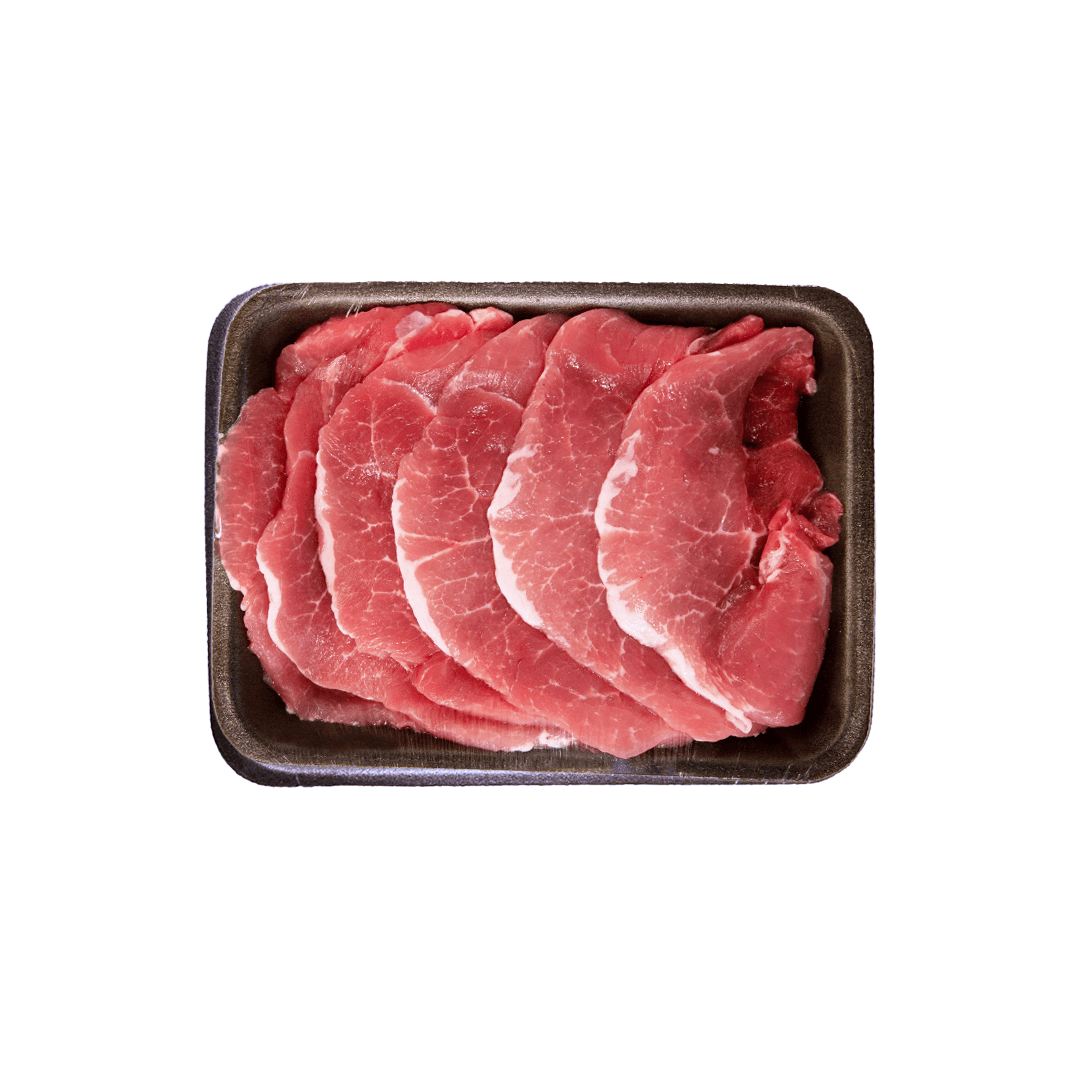 Sliced raw pork chop slices in a black plastic tray.