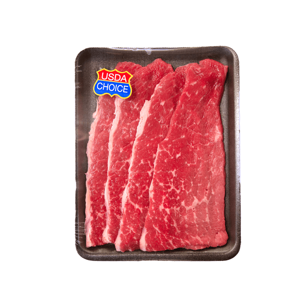 Three USDA Choice beef steaks on a black tray.